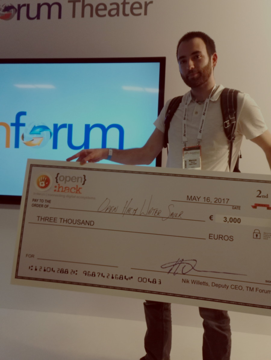 Marcos holding his openhack prize